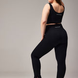 SEAMLESS FLARE PANTS WITH SLIT - BLACK