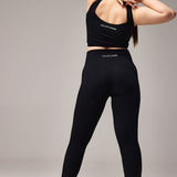 SEAMLESS FLARE PANTS WITH SLIT - BLACK